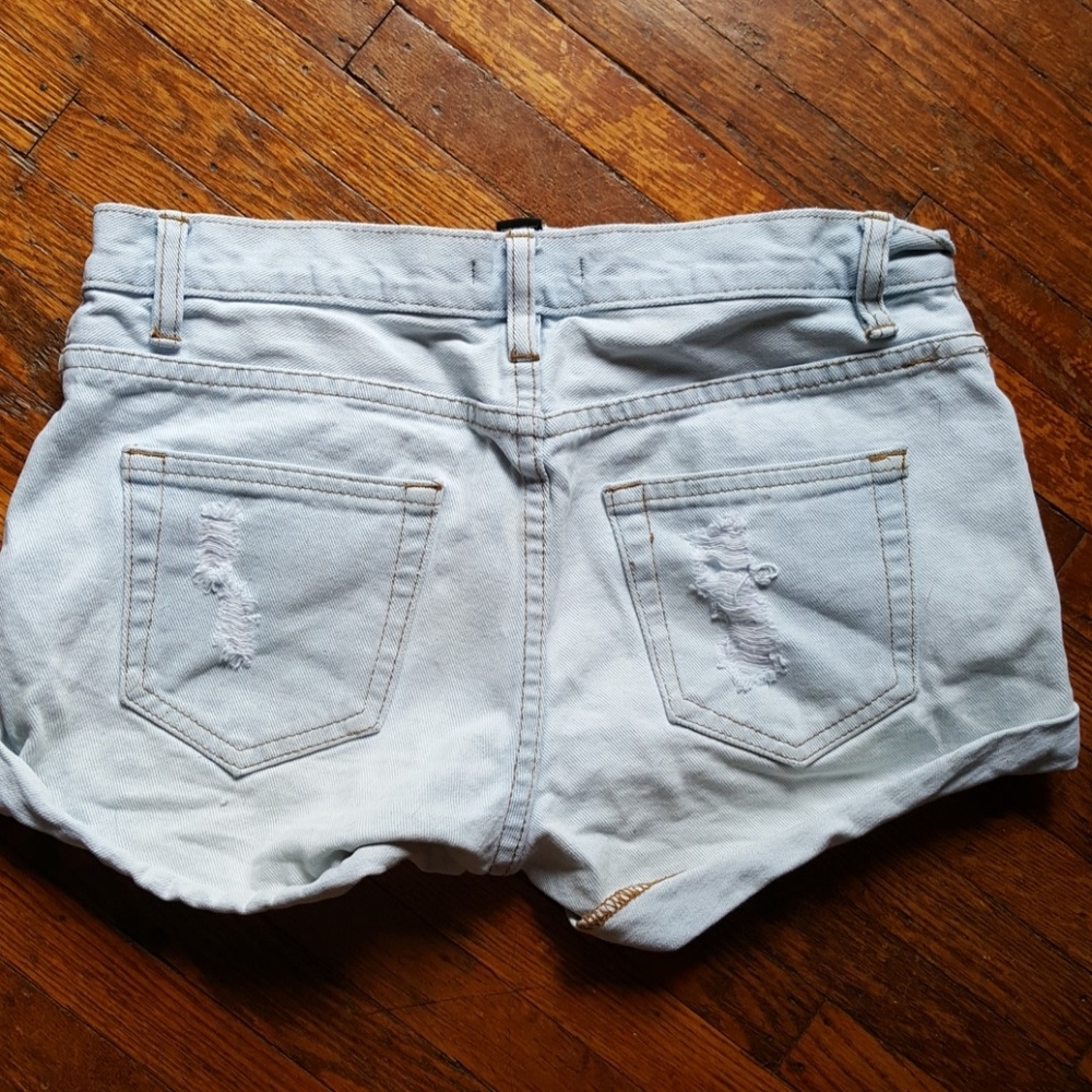 Distressed denim shorts - Picture 2 of 4
